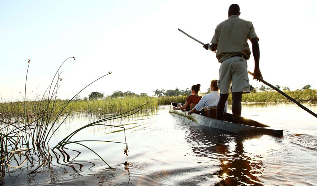 3-Canoe-Trip-with-traditional-mokoro-boat-on-the-river-through-Okavango-Delta